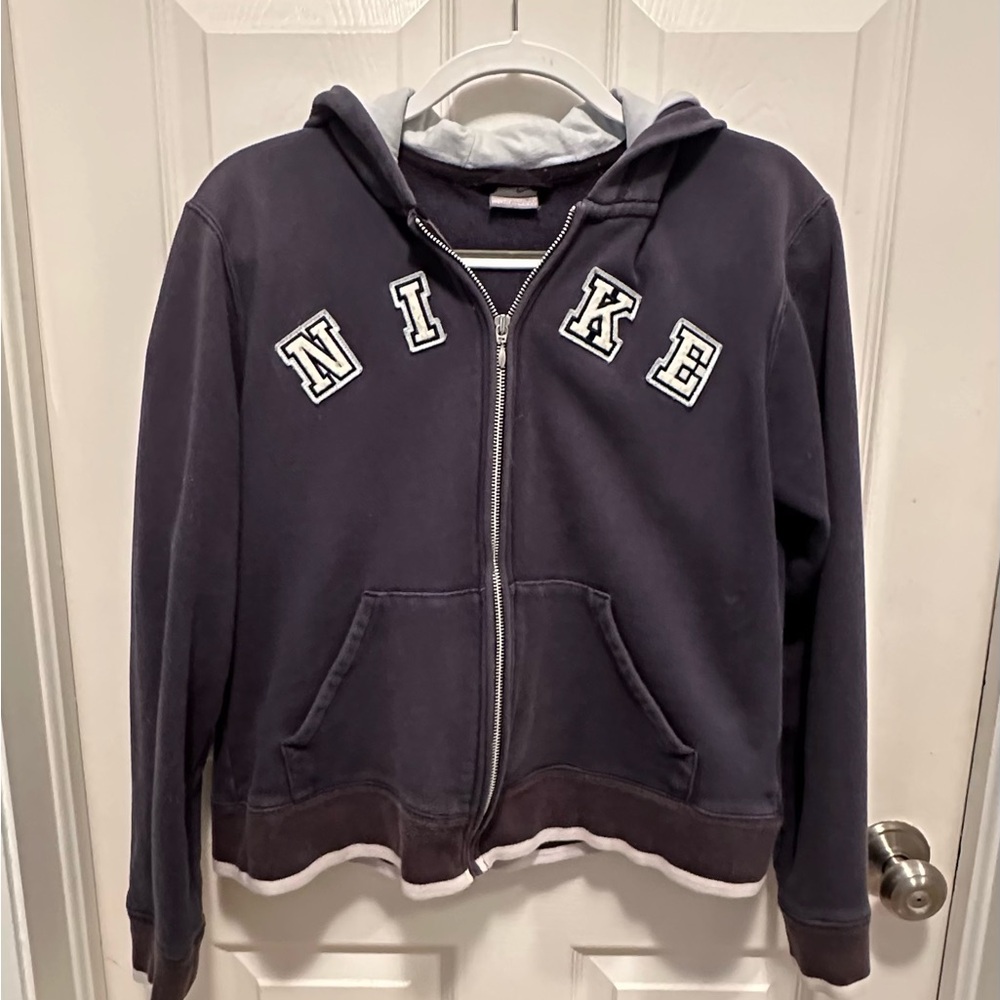 Vintage Nike hoodie. Size Large. Fair condition. The color is navy blue